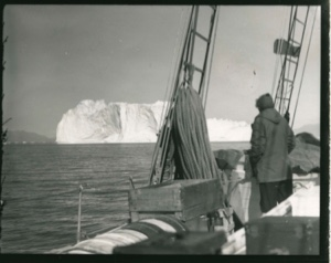 Image: Miriam MacMillan on deck looking at iceberg